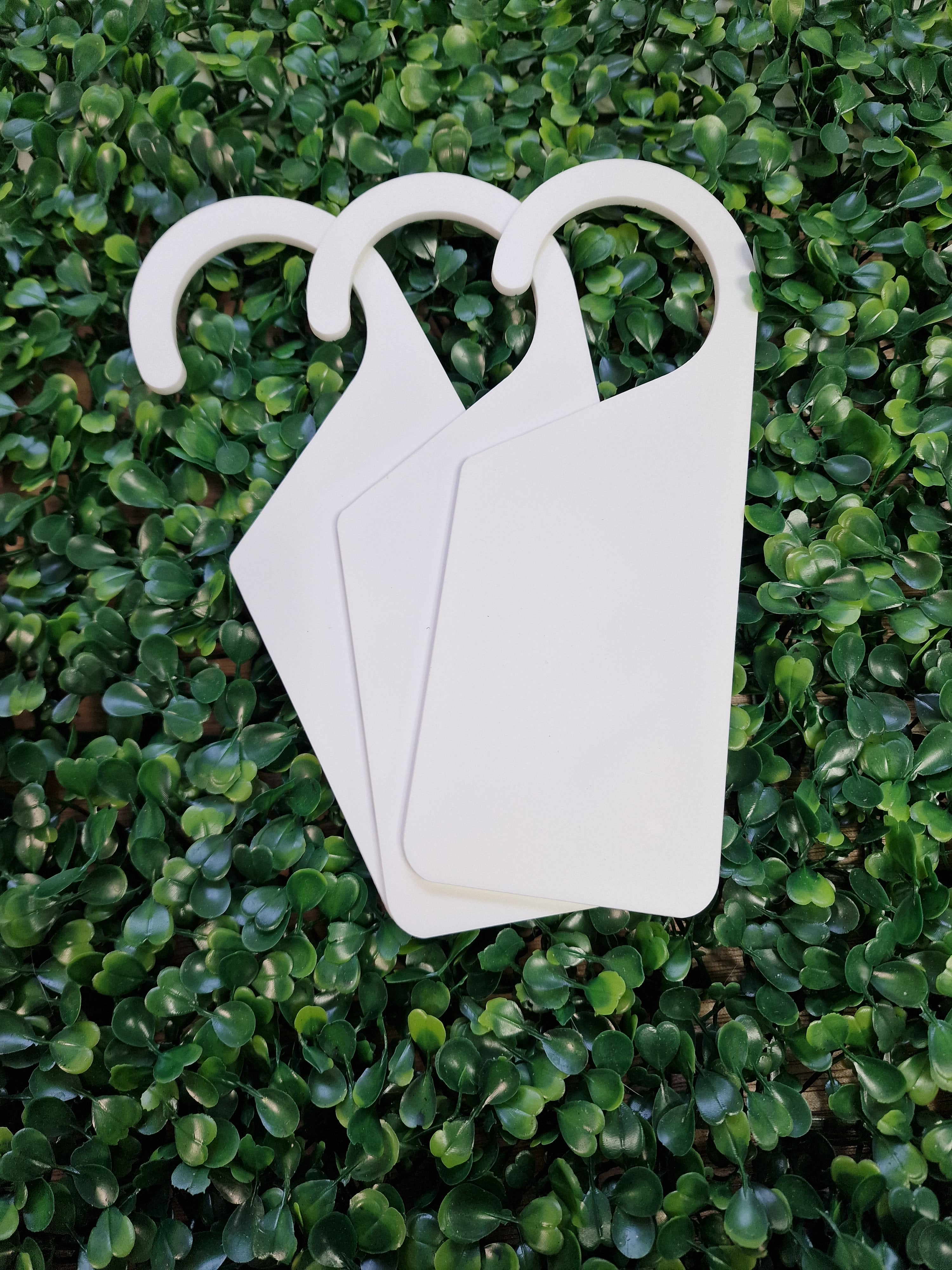 White acrylic door hanger