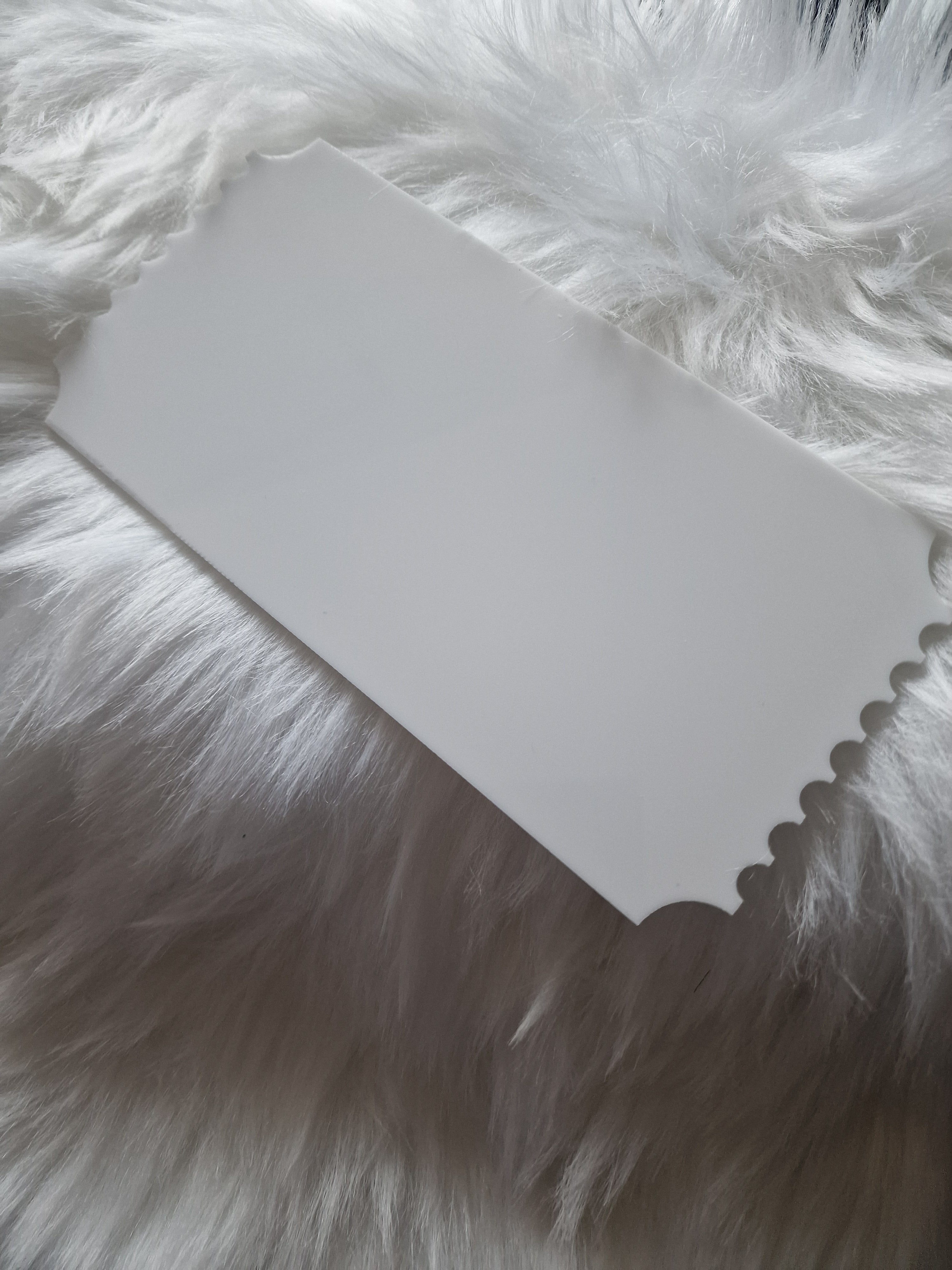 White envelope on a fluffy white surface