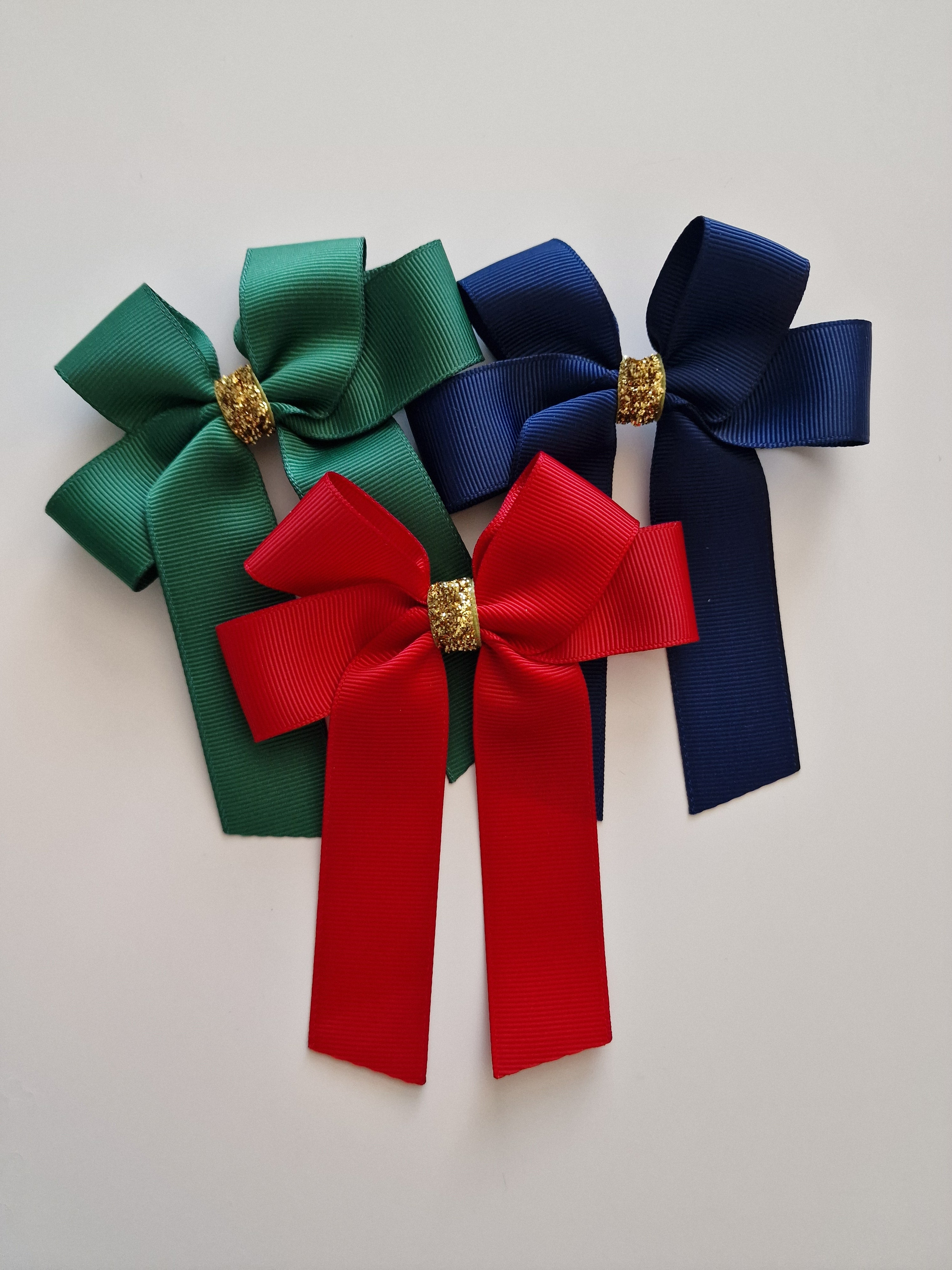 4" grosgrain bows with gold center